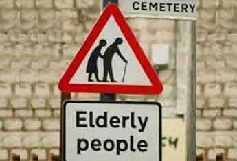 cemetery and elderly crossing signs together