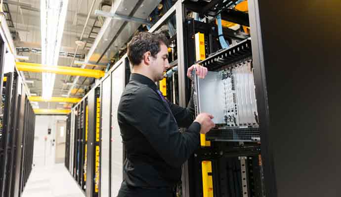 man installing server technology