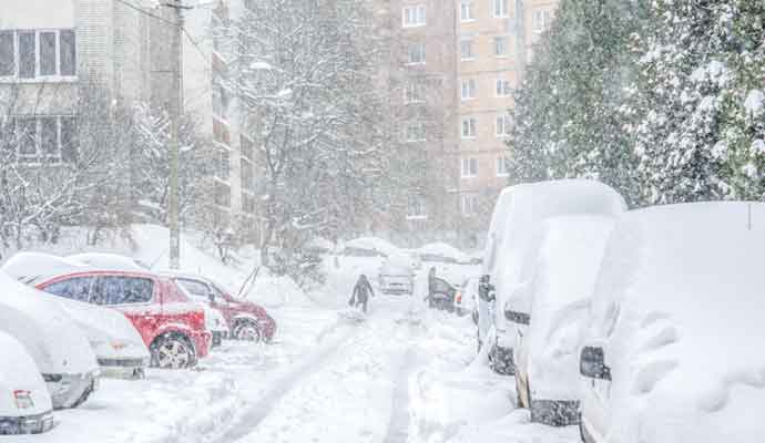 street with heavy snow fall