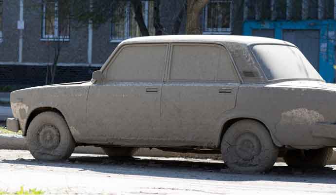 ash covered car