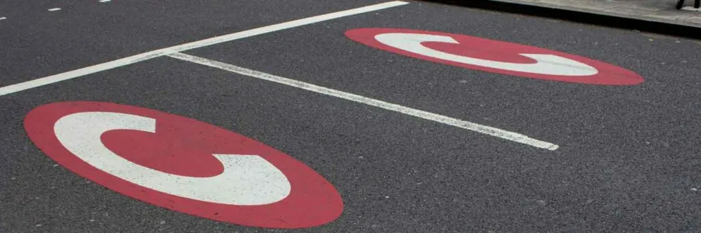 congestion charge sign in road