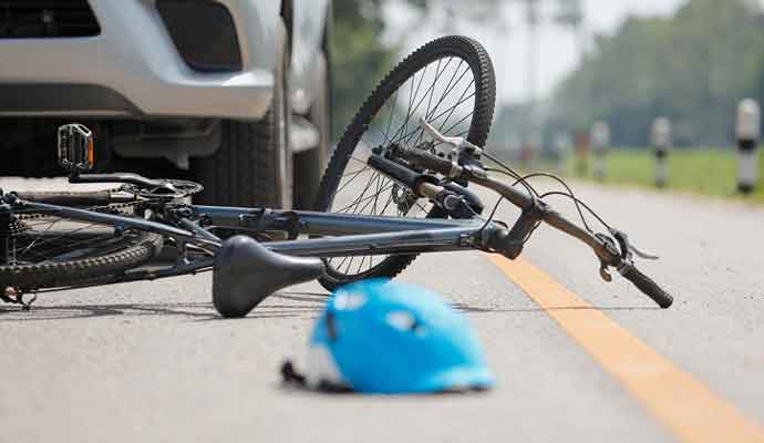 car accident with bicycle on road