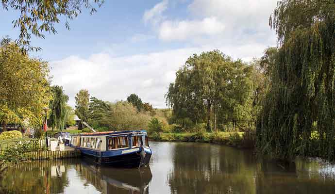 travel on narrow boat moored on the Avon