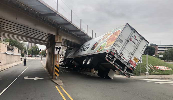 driving jokes truck stuck under bridge