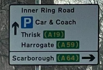thrisk road sign